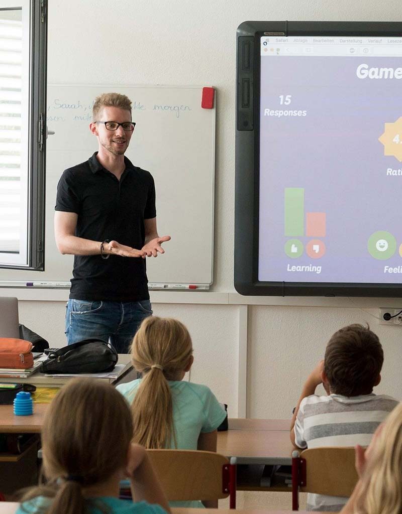 Man giving presentation to a group of students