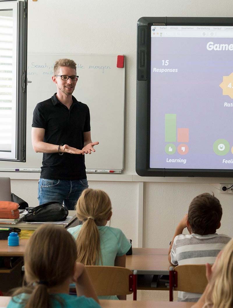 Man giving presentation to a group of students
