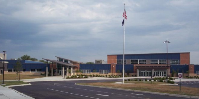 Charlestown High School with American flag