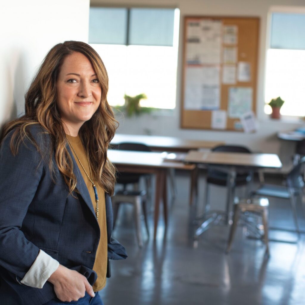 Academies - Teacher near classroom