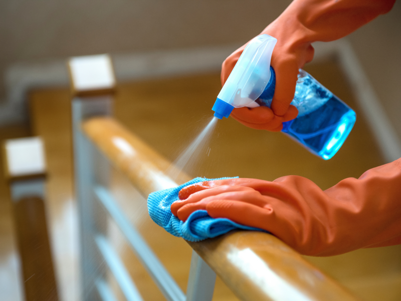Wiping and cleaning a stair rail